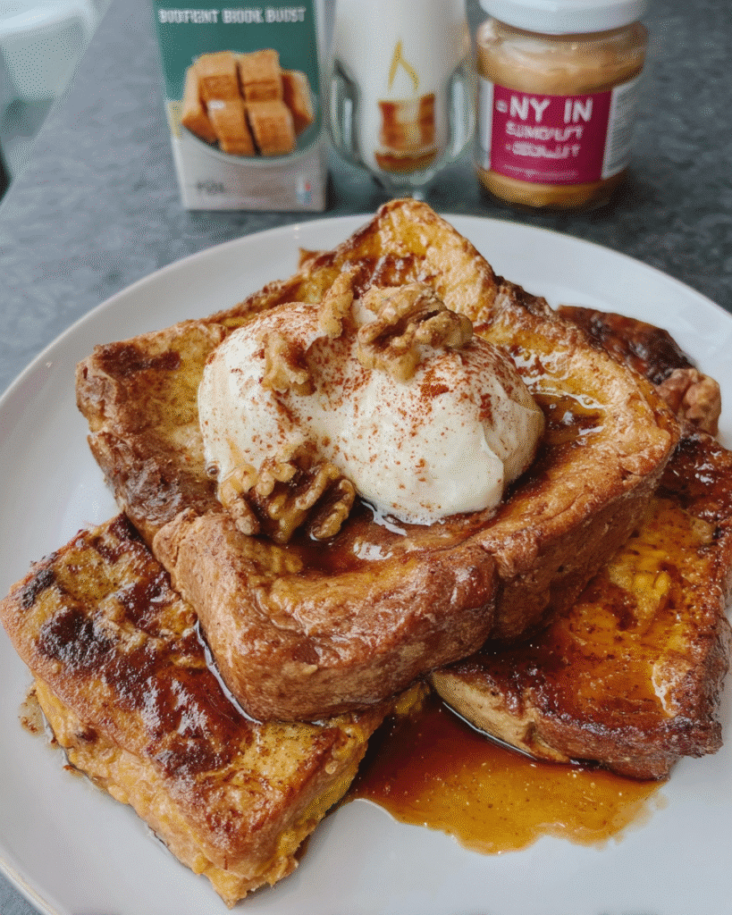 Pumpkin Spice French Toast 9 Indulge in warm, fluffy Pumpkin Spice French Toast! This easy recipe features brioche bread soaked in pumpkin puree and spices, baked to golden perfection, and topped with cheesecake whip and brown butter maple syrup. Perfect for a delicious fall breakfast or brunch!