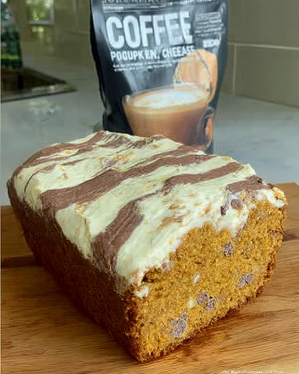 Chocolate Chip Pumpkin Bread 9 Sliced chocolate chip pumpkin bread on a wooden board