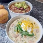 Easy Crock Pot White Chicken Chili Recipe! Creamy, delicious, and ready in under 6 hours. Perfect for a quick, healthy dinner. #whitechickenchili #crockpotrecipe #healthyrecipes #soup #easyrecipe #creamcheese #dinner #recipe #comfortfood #food #chili