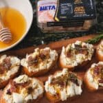 Sweet & Spicy Whipped Feta Crostini 7 Sweet & Spicy Whipped Feta Crostini Bites! Easy 20-minute appetizer recipe with hot honey, pecans, and rosemary. Perfect for holiday parties, Christmas, or any gathering! #crostini #appetizer #holidayfood #partyfood #easyrecipe