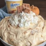 Pumpkin fluff dip with Cool Whip in white bowl