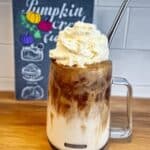 Indulge in a homemade Pumpkin Cream Cold Brew Coffee, a Starbucks copycat recipe! Blend cold brew with a fluffy pumpkin spice cold foam for a delicious and easy fall-flavored coffee drink. Get the recipe and enjoy this perfect combination of coffee, pumpkin, and spice!